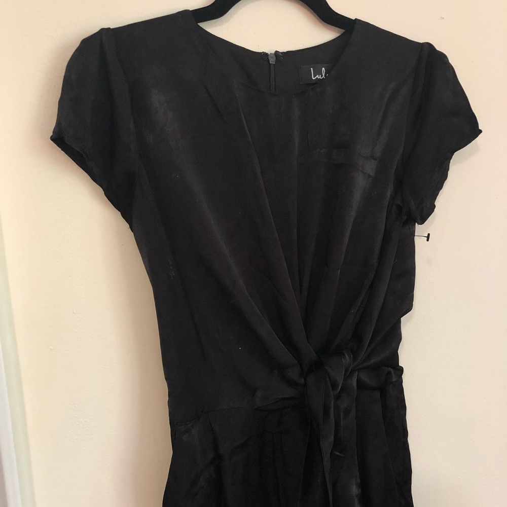 Lulu’s chic black jumpsuit with waist tie